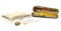 Lot 2B - A gold pear shaped finial stick pin