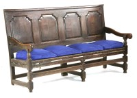 Lot 735 - An early 18th century oak settle