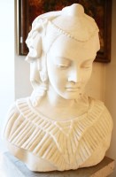 Lot 428 - A marble bust of a maiden wearing a classical headdress with pleated collar