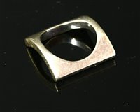 Lot 263 - A white gold Band O ring by Kim Gioielli