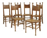 Lot 41 - A set of six Arts and Crafts oak dining chairs