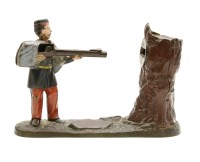 Lot 226 - A 19th century cast iron mechanical money bank