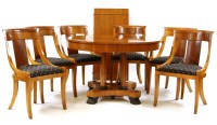 Lot 526 - A Beidermeier style cherrywood dining table and six chairs