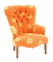 Lot 697 - A Victorian design button back armchair