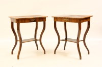 Lot 614 - A pair of walnut lamp tables