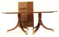 Lot 705 - A reproduction mahogany dining suite