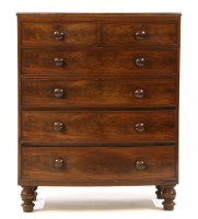 Lot 691 - A tall Victorian bow front mahogany chest of two short and four long drawers