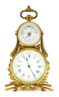 Lot 196 - A late 19th century gilt metal combination clock and barometer