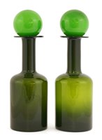 Lot 226 - Two green glass 'Gulvvase' bottle decanters and ball stoppers
