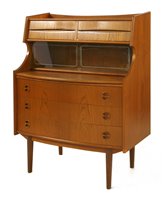 Lot 297 - A Danish teak desk bureau