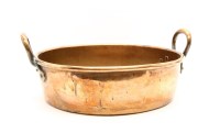 Lot 370 - A twin handled large copper preserving pan with rolled rim