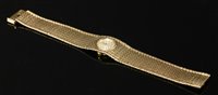 Lot 235 - A ladies' 9ct gold Winegartens mechanical bracelet watch
