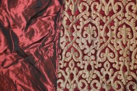 Lot 407 - A pair of red and gold embroidered curtains