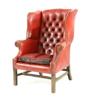 Lot 719 - A Georgian style wing chair