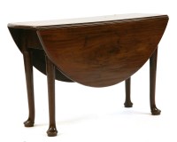 Lot 580 - An 18th century mahogany drop leaf table