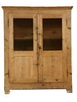 Lot 577 - A French pine larder cupboard