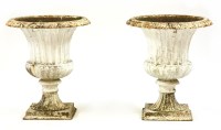 Lot 602 - A pair of Victorian cast iron campana shaped urns