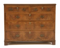 Lot 710 - An 18th century walnut and oak straight front chest