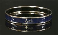 Lot 670 - A narrow Hermès calèche bangle