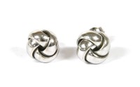 Lot 21 - A pair of 18ct white gold knot earrings retailed by Cellini