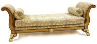 Lot 518 - A Beidermeier design blondewood and parcel gilt day bed