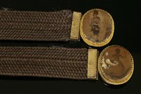 Lot 12 - A pair of Regency gold-mounted woven hair bracelets