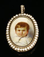 Lot 88 - An Edwardian gold and split pearl set painted miniature portrait of a young child, c.1910