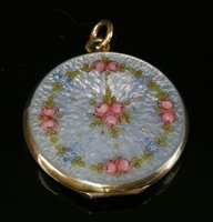 Lot 140 - A Continental silver and emerald circular hinged locket