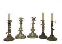 Lot 265 - Three iron spiral ejector candlesticks