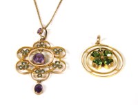Lot 104 - An Edwardian gold peridot shamrock pendant