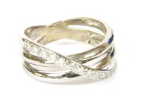 Lot 58 - A 9ct white gold diamond set three row band ring 
marked 0.13 assumed estimated diamond weight