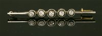 Lot 176 - A Continental Art Deco five stone diamond bar brooch