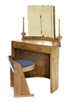 Lot 275 - An Art Deco limed oak dressing table and stool