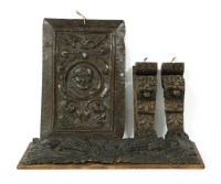 Lot 323 - A pair of 19th century oak brackets in the form of lions mask monopedia