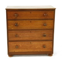 Lot 705 - A Victorian oak chest of four long drawers