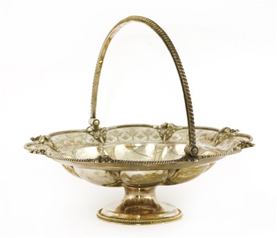 Lot 16 - A Victorian swing-handled silver cake basket