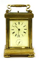 Lot 776 - A French brass carriage clock