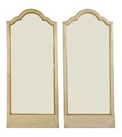 Lot 562 - A pair of painted and gilt wall mirrors