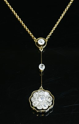 Lot 110 - A gold diamond set Edna May pendant, c.1915
