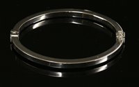 Lot 319 - An Italian white gold hollow hinged bangle