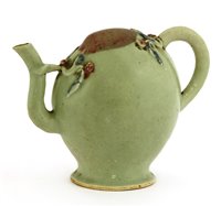 Lot 61 - A Chinese peach shaped Cadogan wine pot