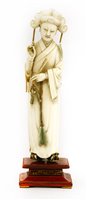Lot 239 - A Chinese ivory figure