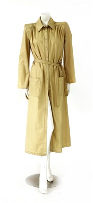 Lot 193 - A cream mackintosh