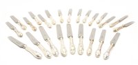 Lot 115 - Twelve cast handled dinner knives