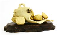 Lot 344 - A Japanese ivory okimono