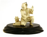 Lot 346 - A Japanese ivory okimono