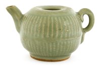 Lot 25 - A Chinese Longquan celadon teapot