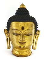 Lot 192 - A Chinese gilt bronze head of Buddha