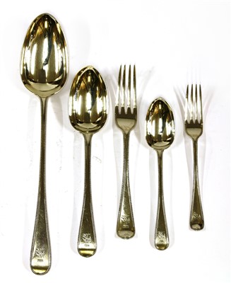 Lot 131 - A part canteen of Victorian bead pattern silver flatware