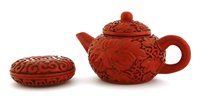Lot 493 - A Chinese lacquered Yixing teapot